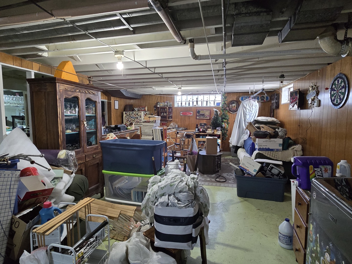 1408 South 10th Street Clinton, IA 52732 - Photo 6 of 10 a room with lots of storage and lots of furniture