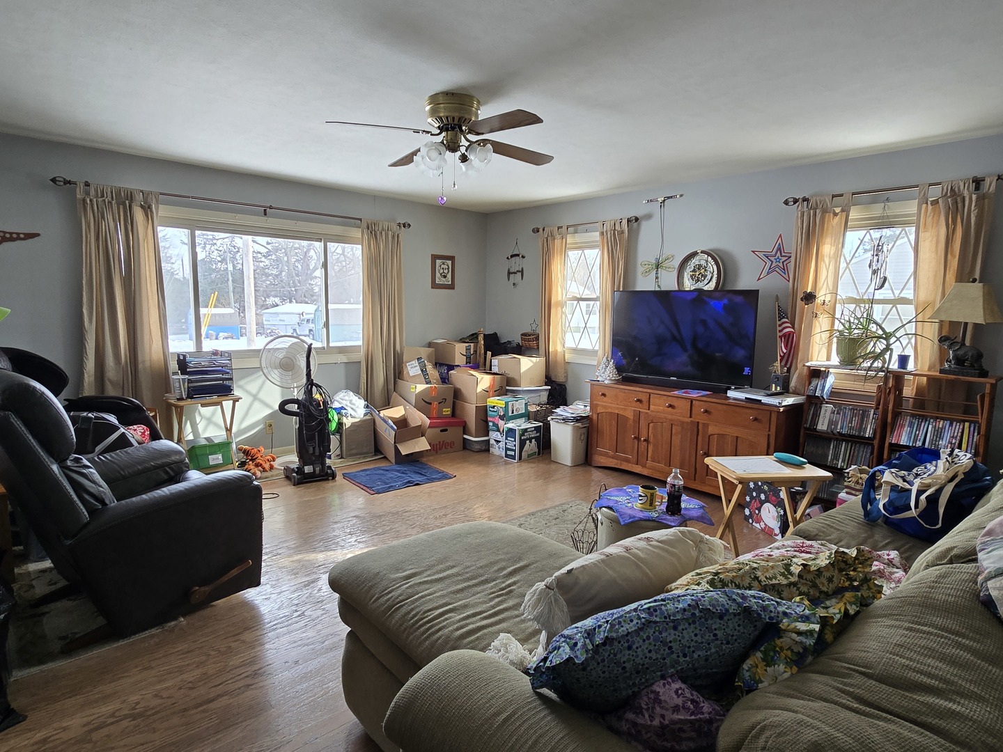 1408 South 10th Street Clinton, IA 52732 - Photo 8 of 10 a living room with furniture and a large window
