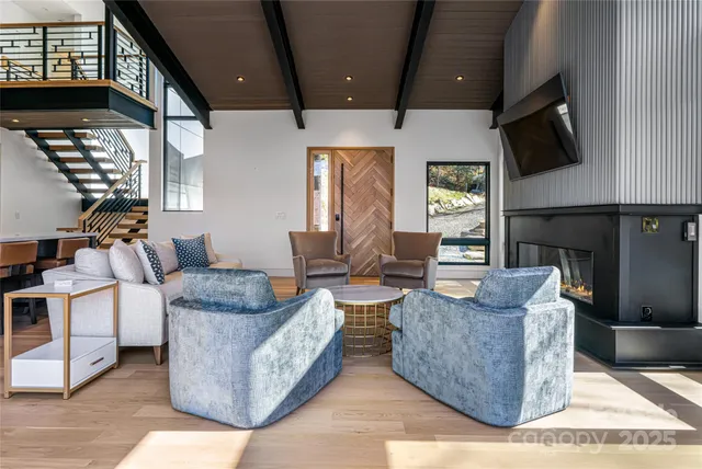 a view of living room and patio area