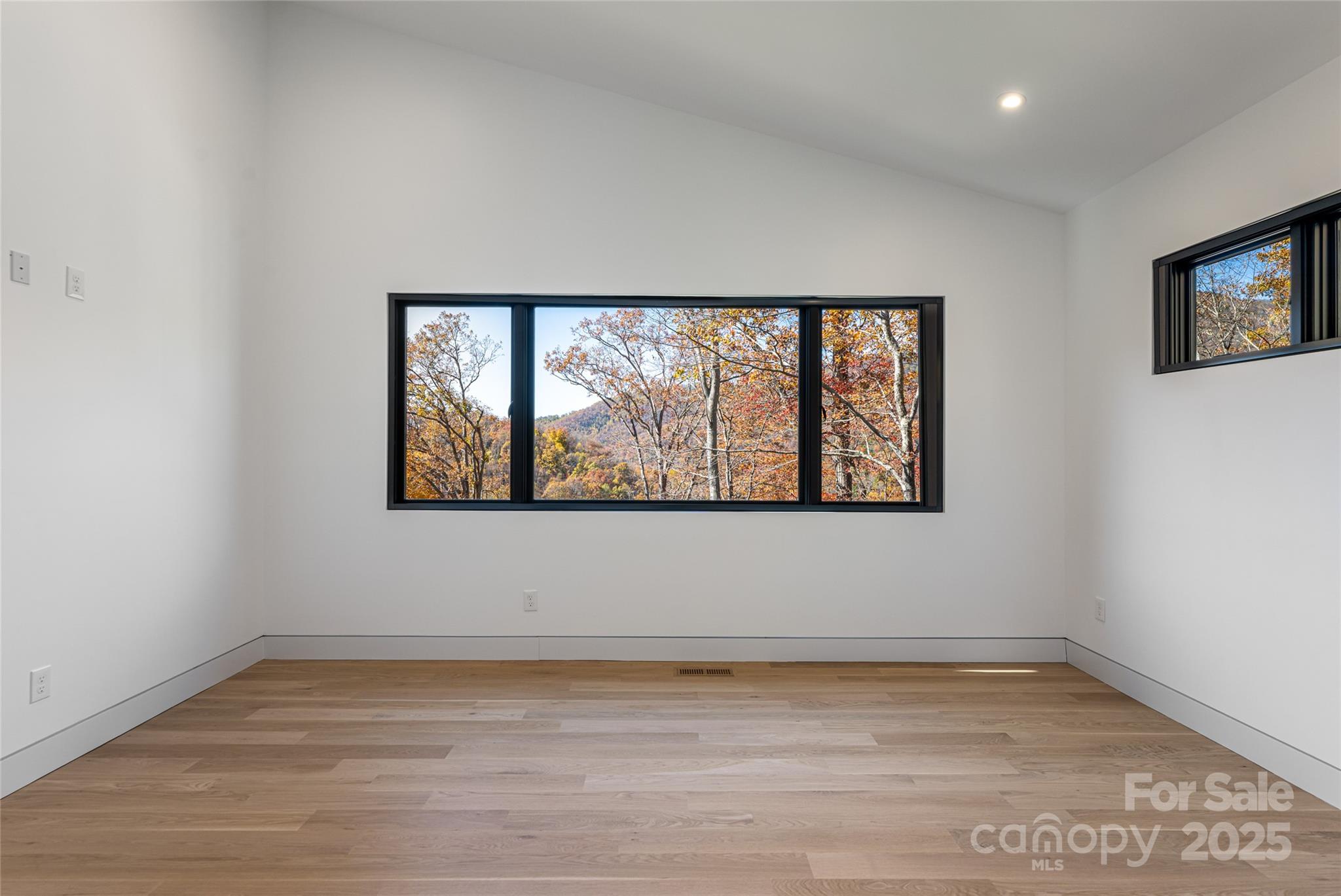 371 Oklahoma Road Montreat, NC 28711 - Photo 23 of 48 a view of empty room with window