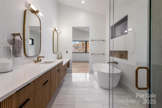 a bathroom with a sink vanity and a mirror