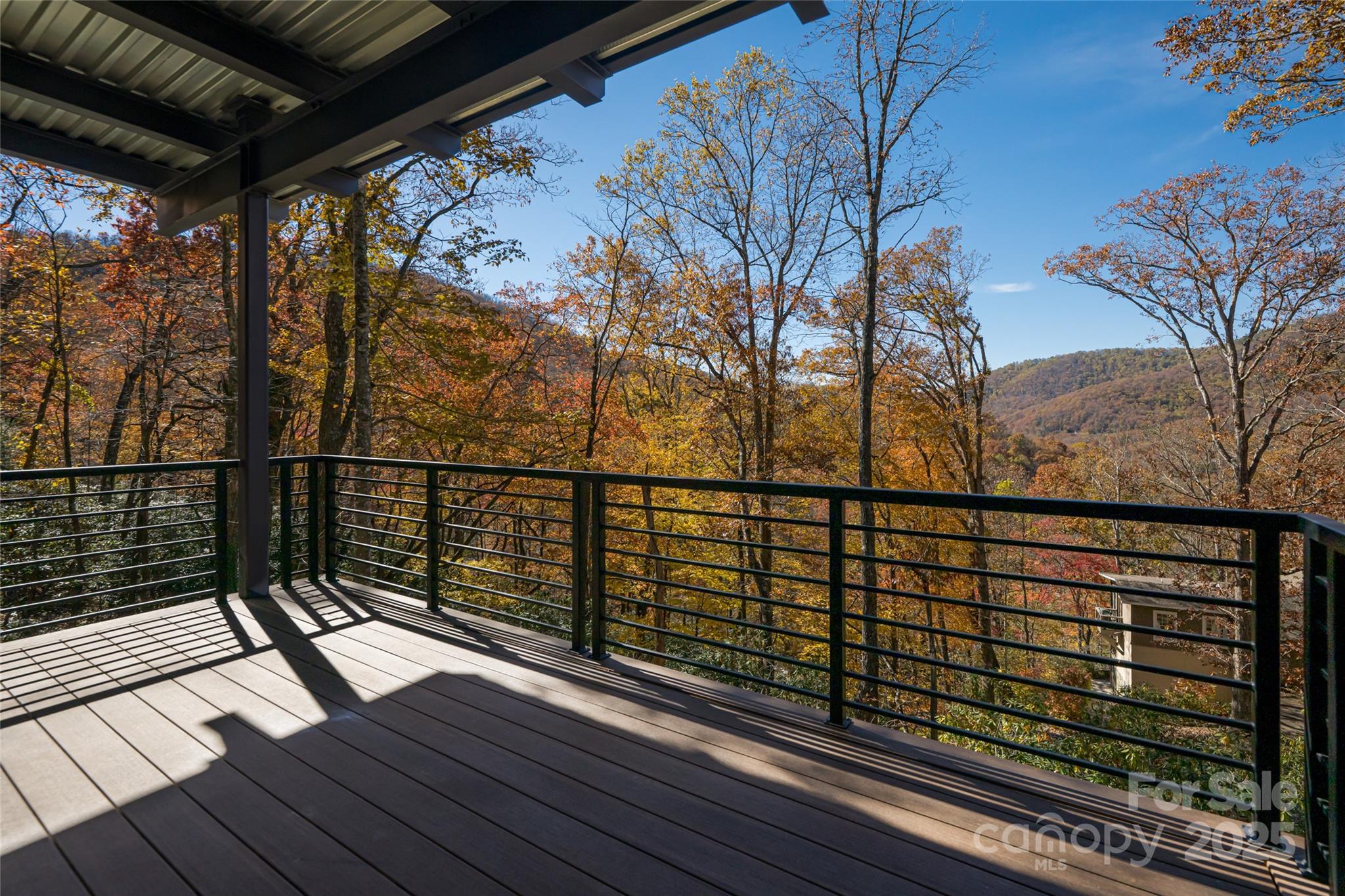 371 Oklahoma Road Montreat, NC 28711 - Photo 37 of 48 a view of a balcony with wooden floor