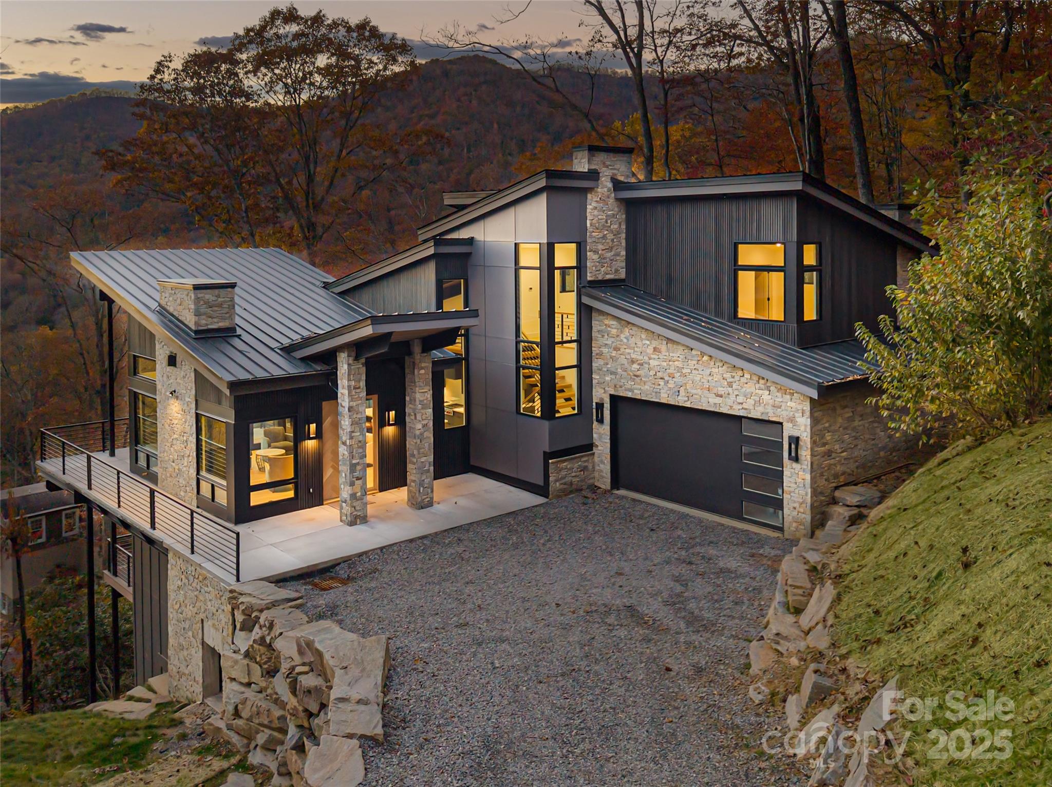 371 Oklahoma Road Montreat, NC 28711 - Photo 48 of 48 a front view of a house with barbeque oven and outdoor seating