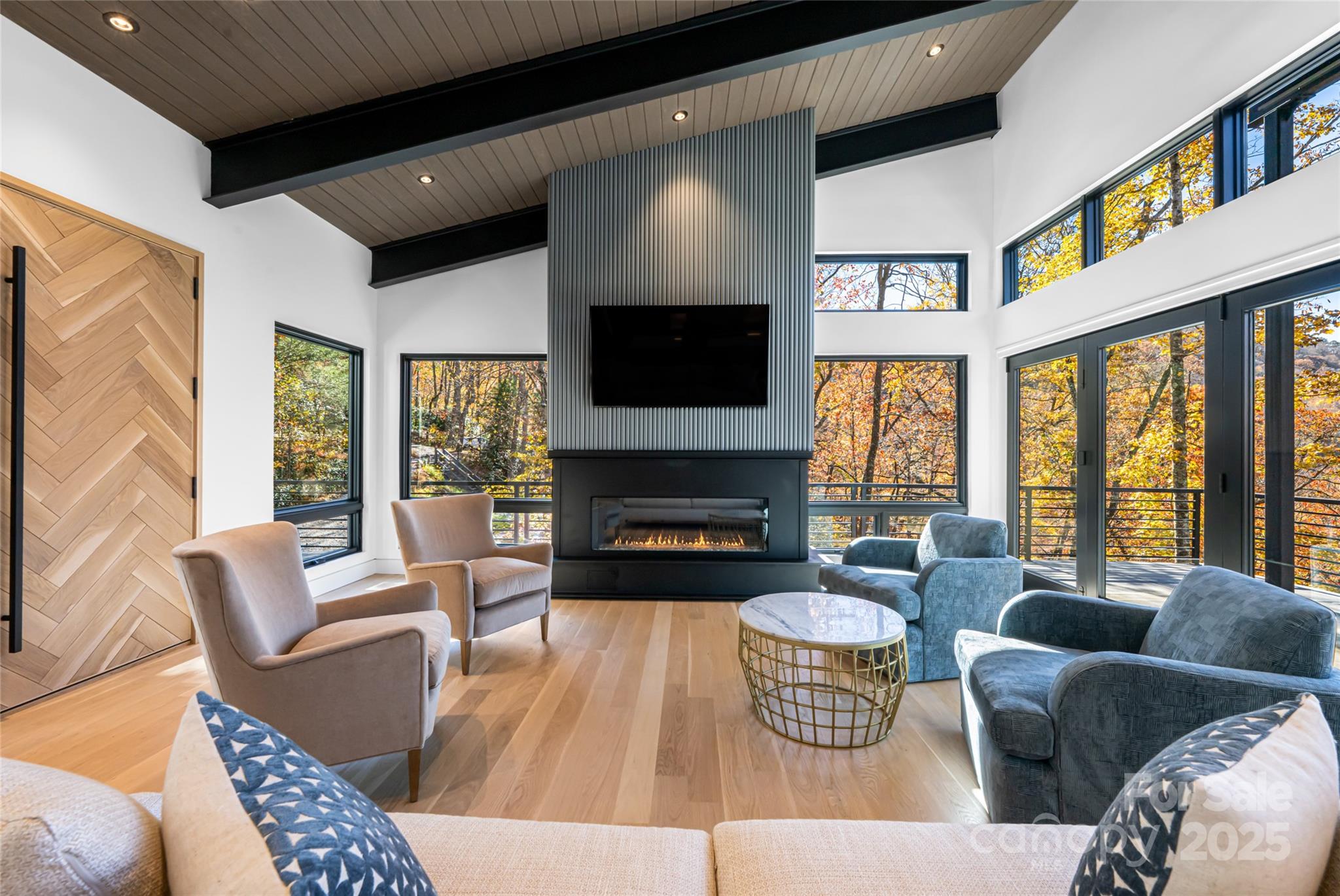 371 Oklahoma Road Montreat, NC 28711 - Photo 7 of 48 a living room with furniture fireplace and a flat screen tv
