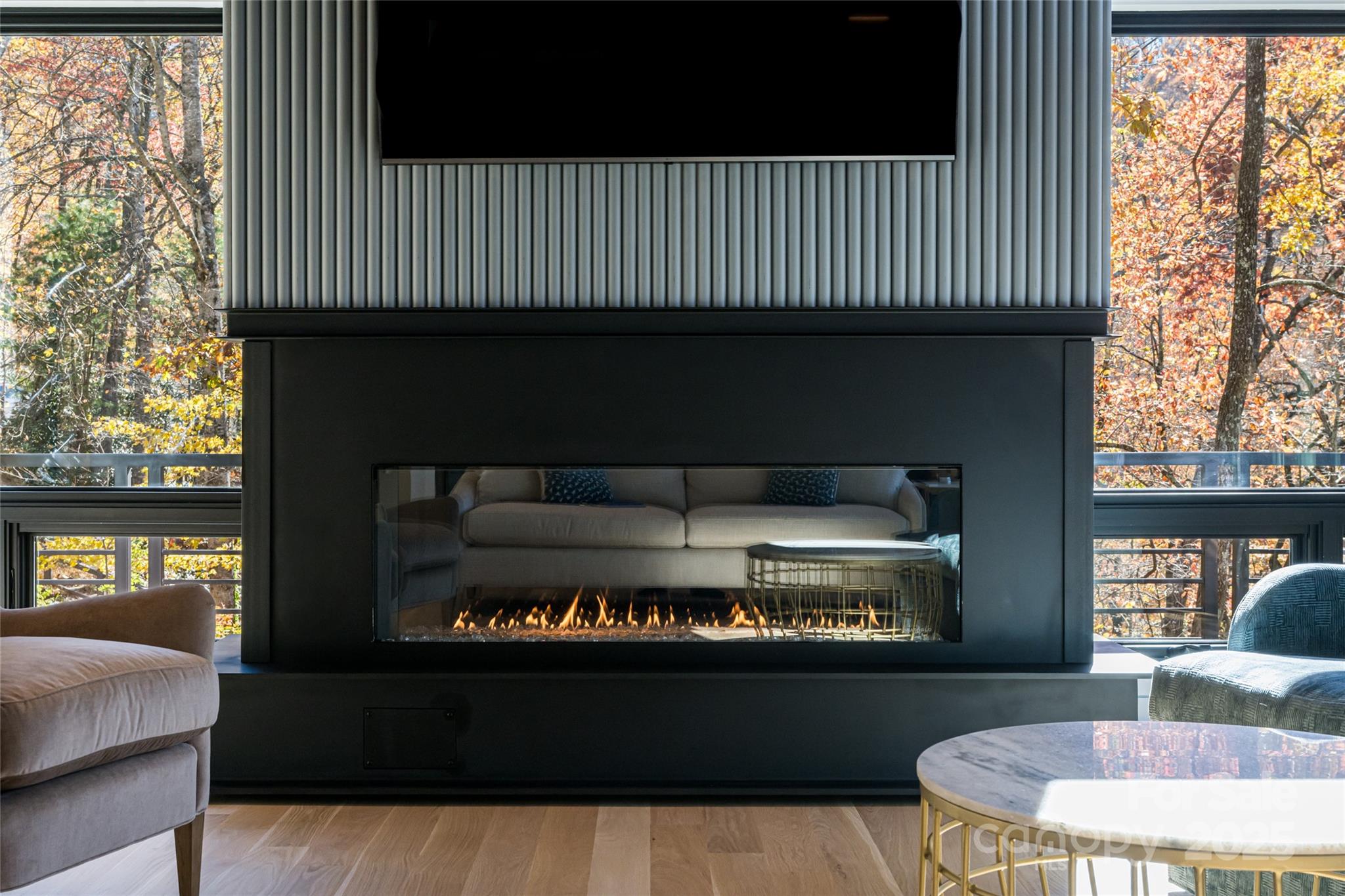 371 Oklahoma Road Montreat, NC 28711 - Photo 10 of 48 a kitchen with a stove and a wooden floor