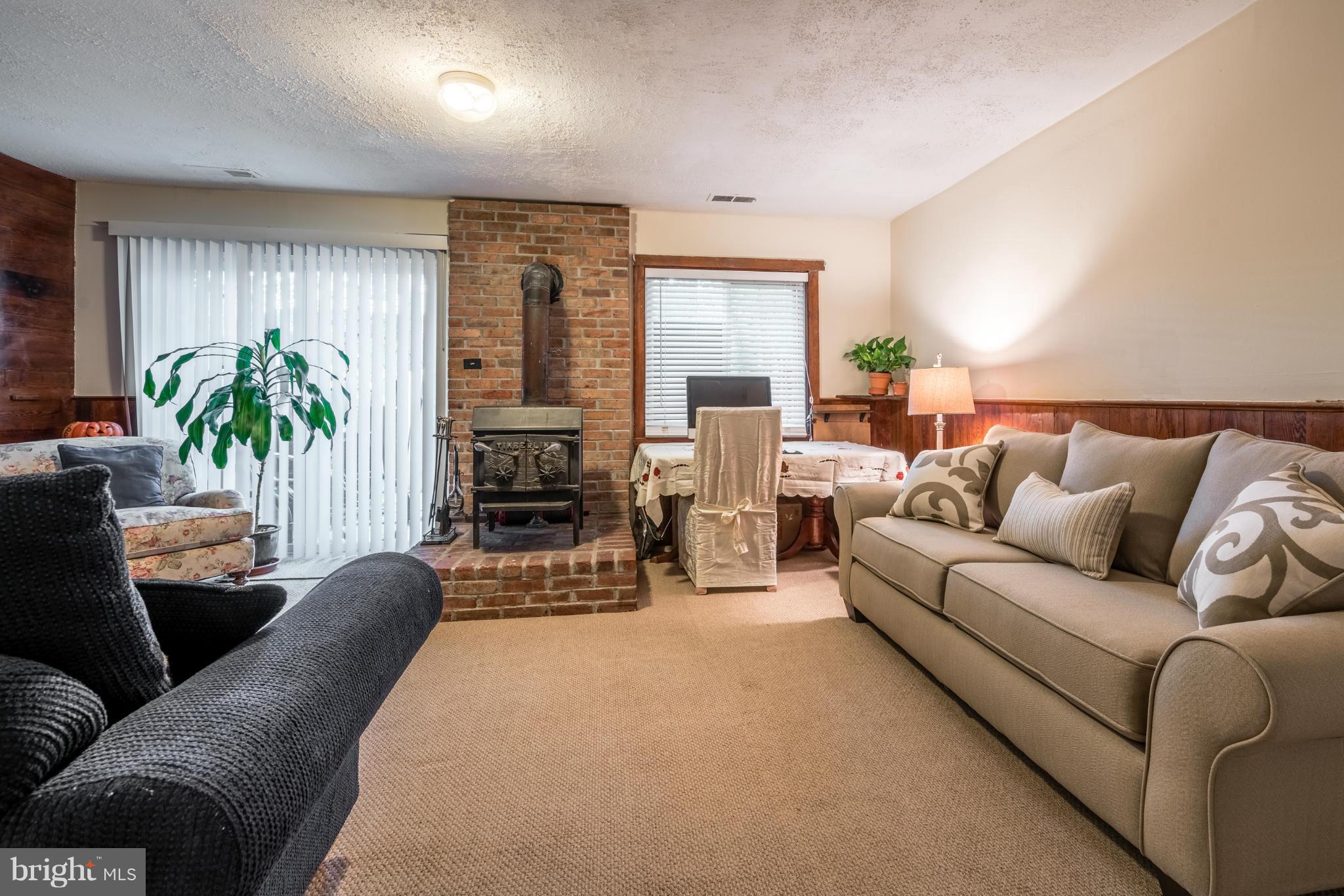 2402 Southgate Square Reston, VA 20191 - Photo 15 of 21 a living room with furniture and a fireplace