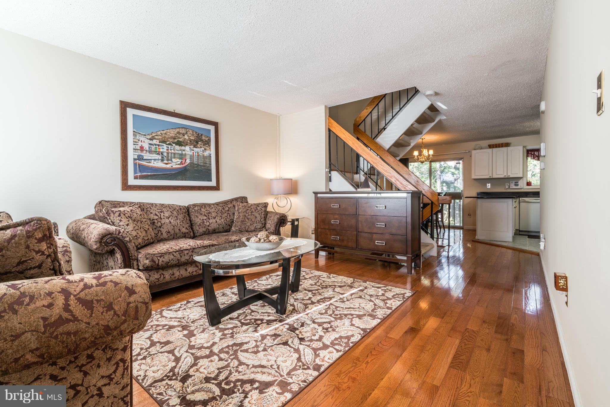 2402 Southgate Square Reston, VA 20191 - Photo 5 of 21 a living room with furniture and a wooden floor