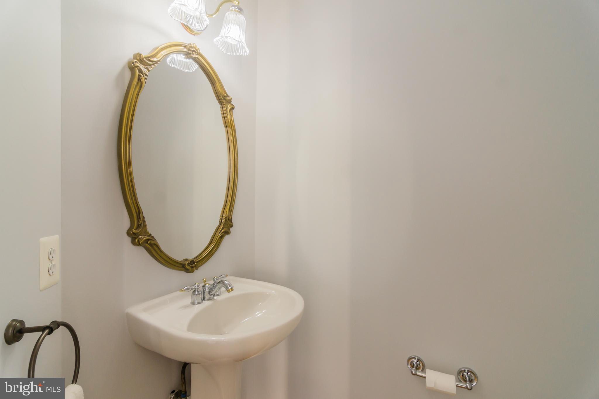 3928 Addison Woods Road Frederick, MD 21704 - Photo 22 of 53 half bathroom in the main level