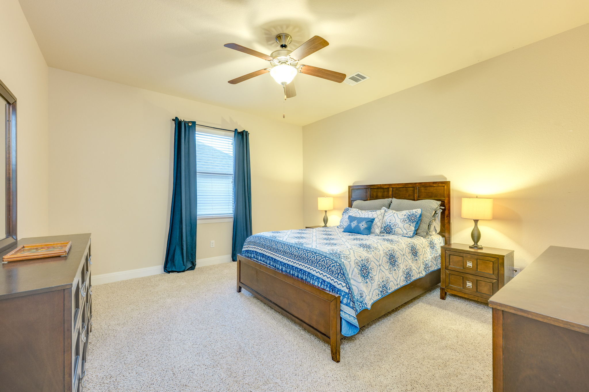 2208 Allison Way Cedar Park, TX 78613 - Photo 24 of 40 a bed sitting in a spacious bedroom next to a window
