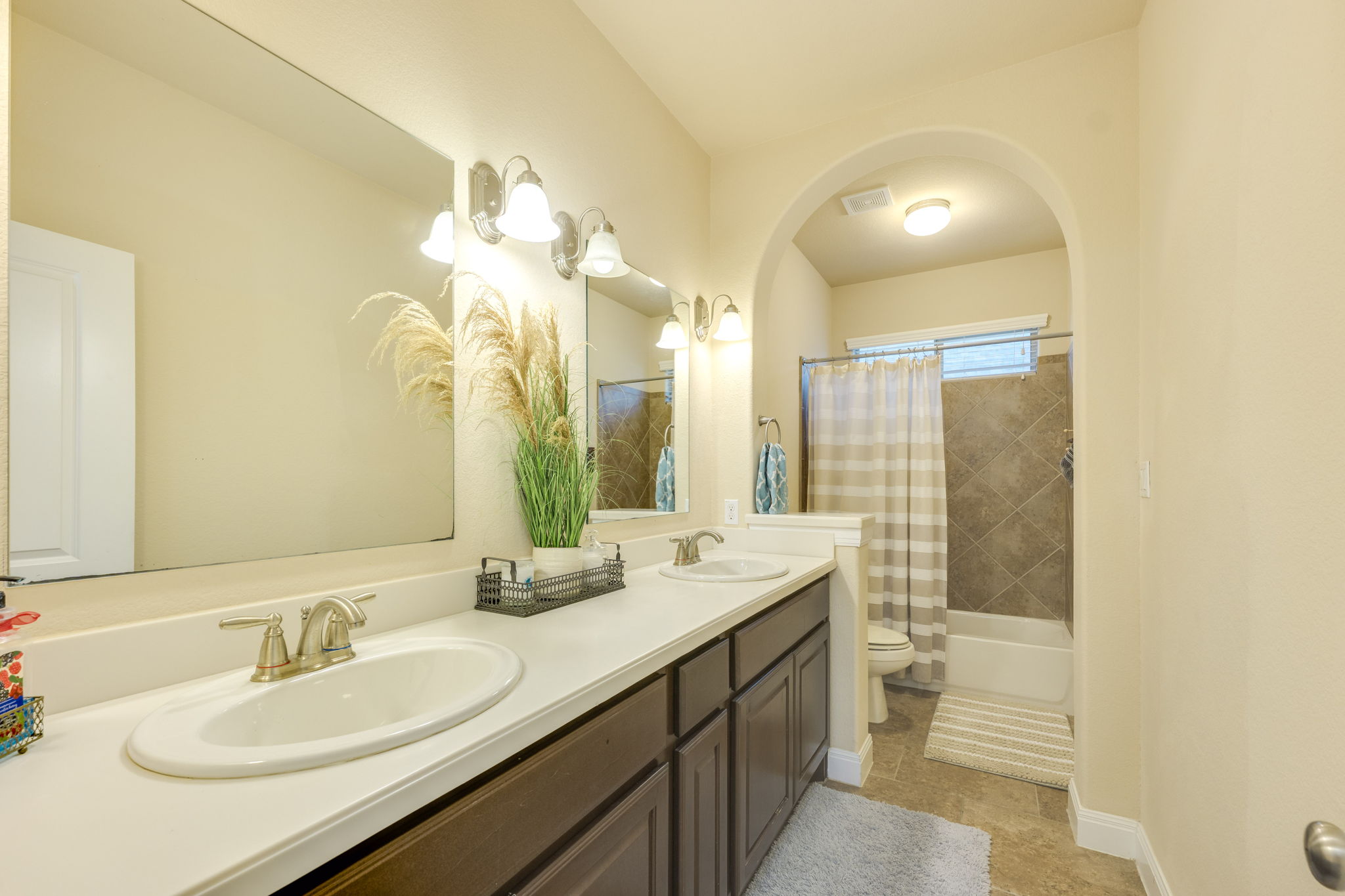 2208 Allison Way Cedar Park, TX 78613 - Photo 25 of 40 a bathroom with a double vanity sink mirror and double