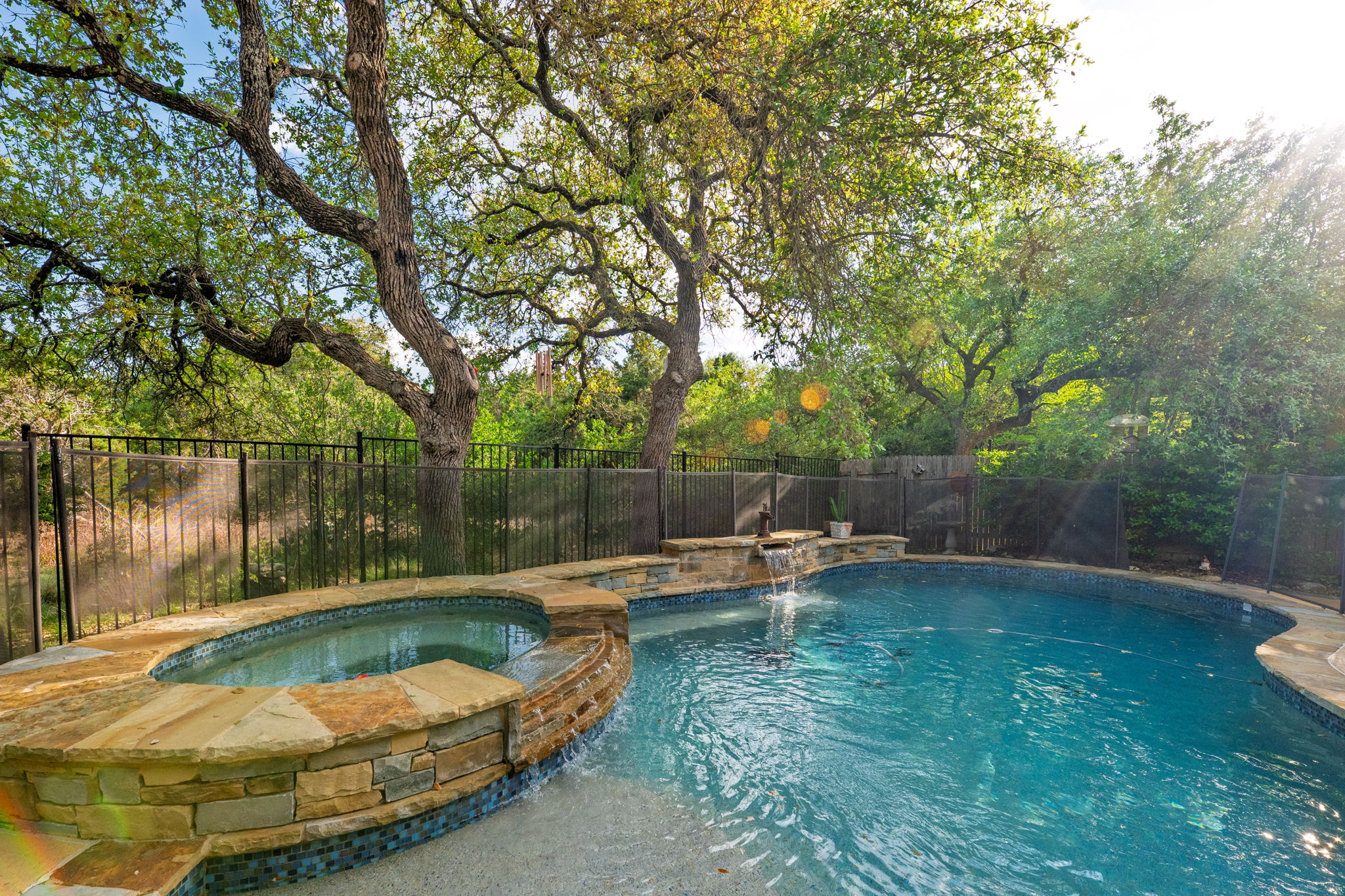 2208 Allison Way Cedar Park, TX 78613 - Photo 29 of 40 a view of a lake with a wooden deck and a lake