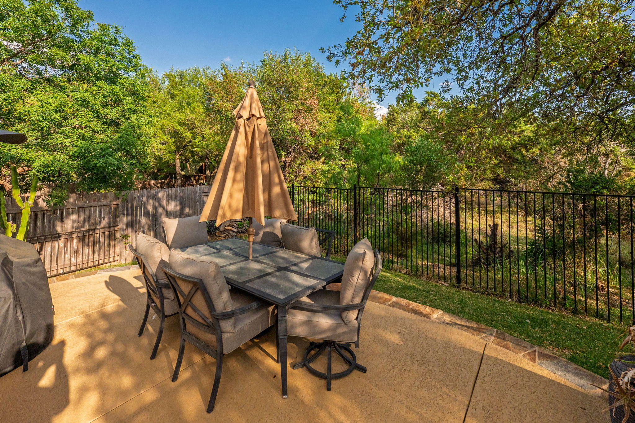 2208 Allison Way Cedar Park, TX 78613 - Photo 30 of 40 a view of backyard with a table and chairs