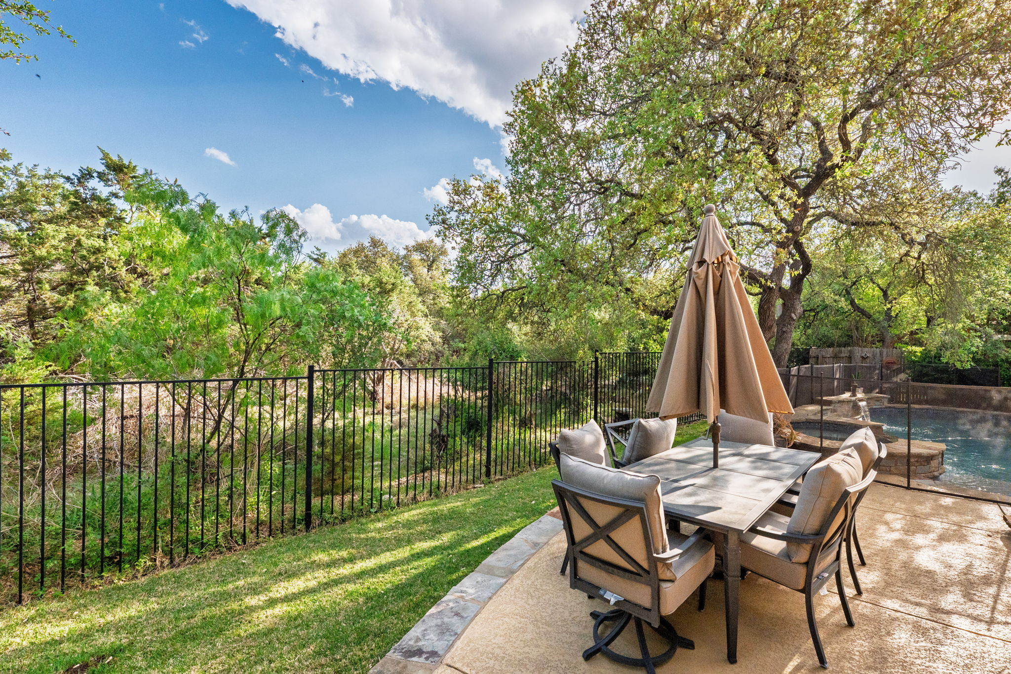 2208 Allison Way Cedar Park, TX 78613 - Photo 31 of 40 a view of a backyard with a table and chairs