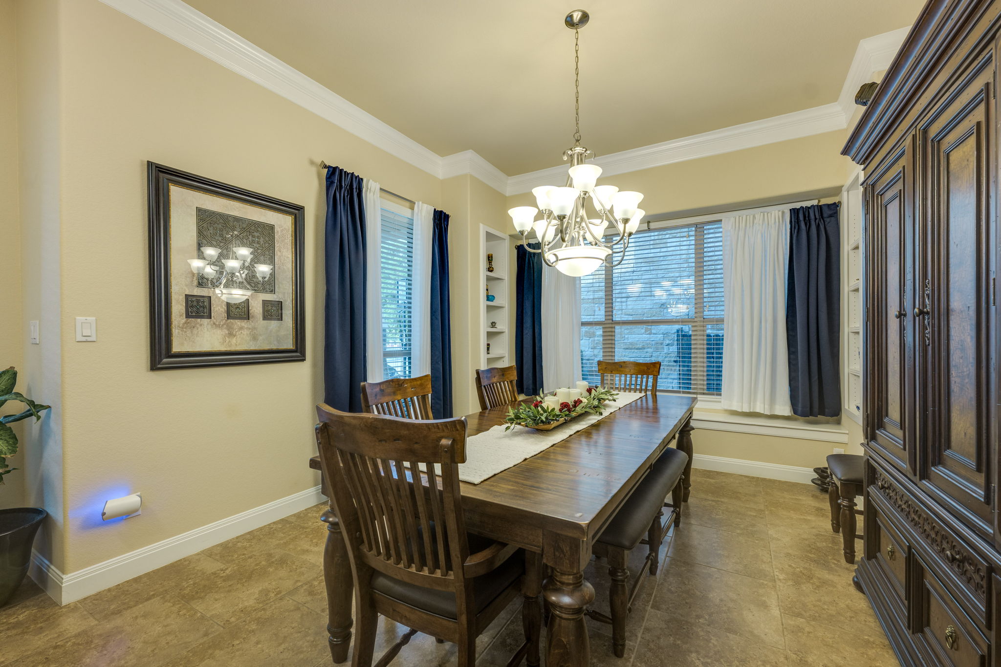 2208 Allison Way Cedar Park, TX 78613 - Photo 5 of 40 a dining room with furniture a chandelier and window