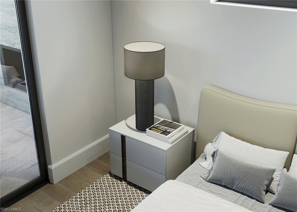 708 100th Avenue North Naples, FL 34108 - Photo 9 of 19 a living room with a couch and a table