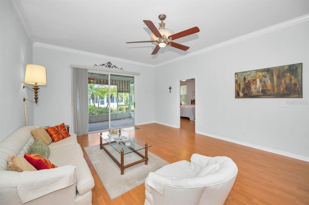 12154 Putter Green Court New Port Richey, FL 34654 - Photo 19 of 73 a living room with furniture and a window