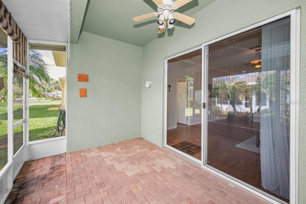 12154 Putter Green Court New Port Richey, FL 34654 - Photo 29 of 73 a view of empty room with wooden floor and fan