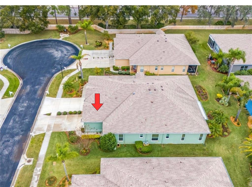12154 Putter Green Court New Port Richey, FL 34654 - Photo 73 of 73 an aerial view of residential house with outdoor space and swimming pool