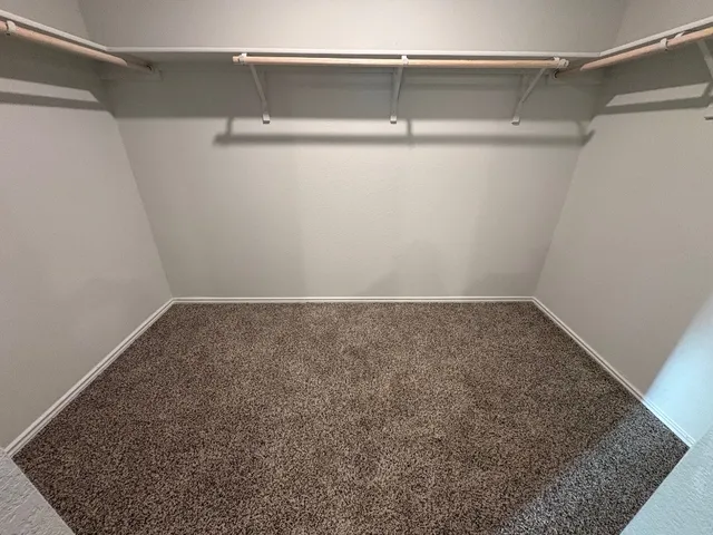 a view of a room with racks on the wall