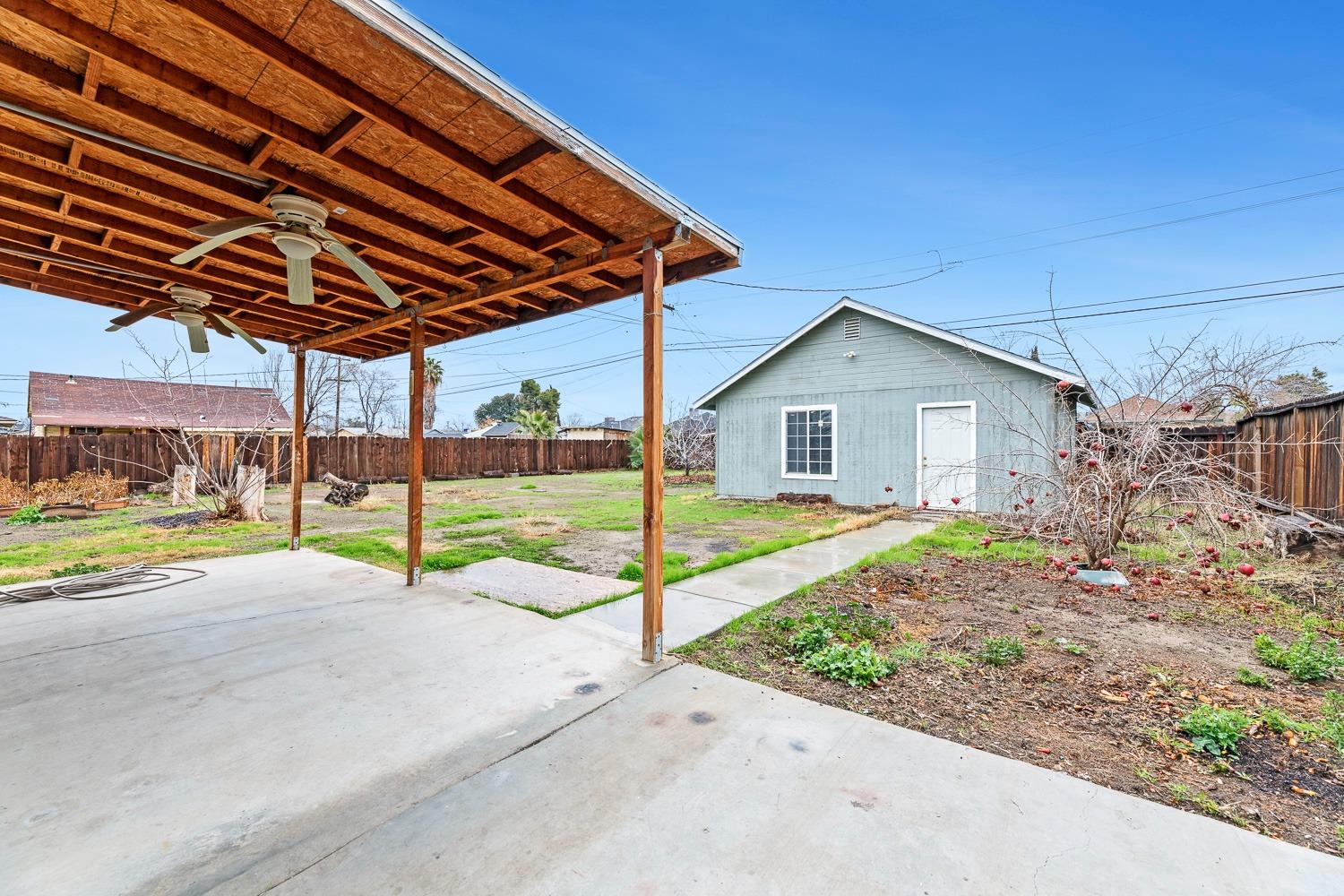 249 Jackson Street Coalinga, CA 93210 - Photo 31 of 42 a view of a backyard of house