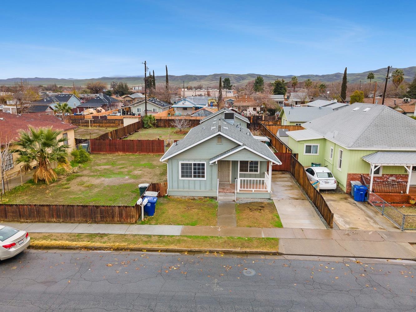 249 Jackson Street Coalinga, CA 93210 - Photo 33 of 42 a view of a swimming pool with a lawn chairs