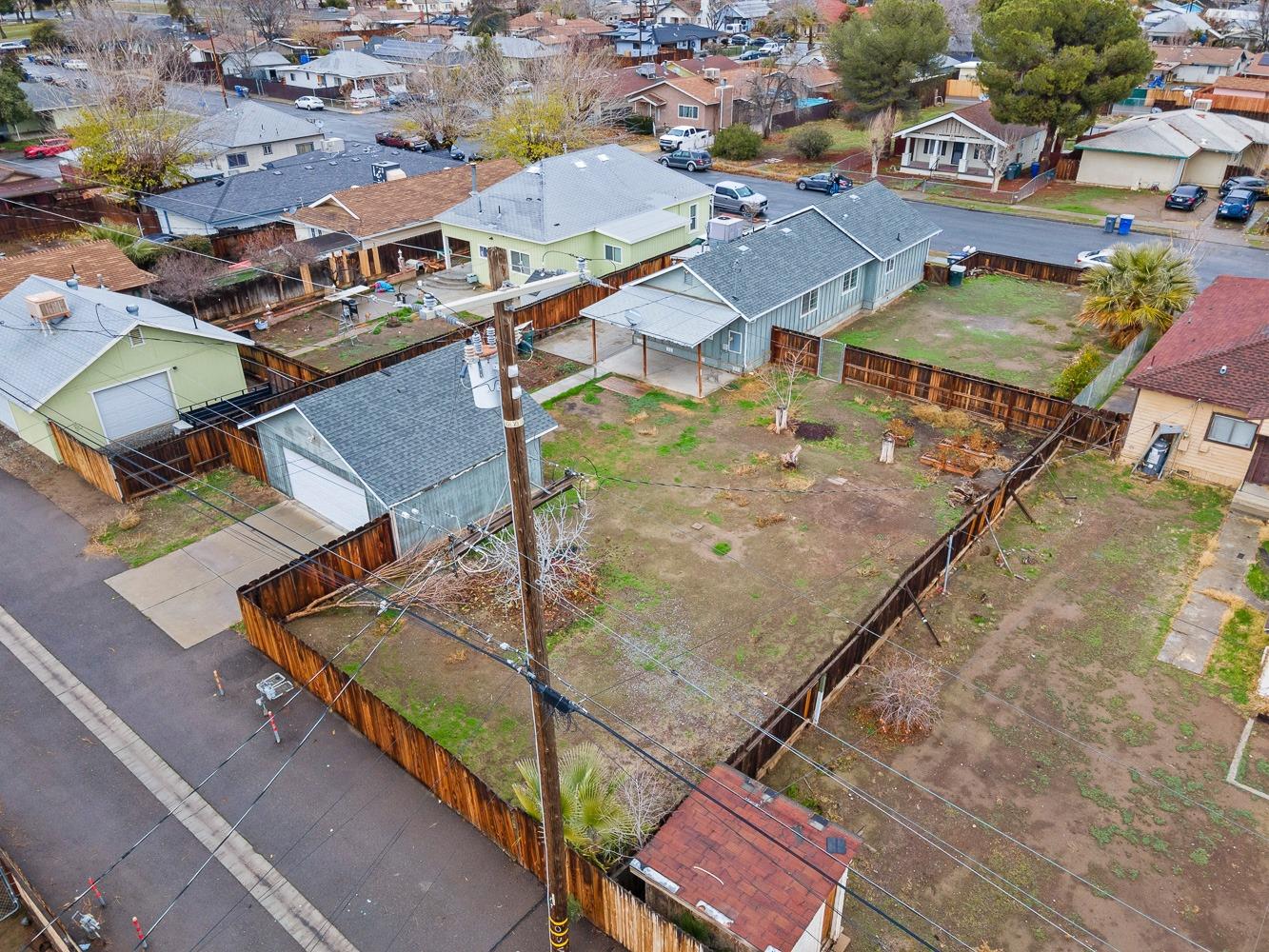 249 Jackson Street Coalinga, CA 93210 - Photo 36 of 42 an aerial view of residential houses with outdoor space