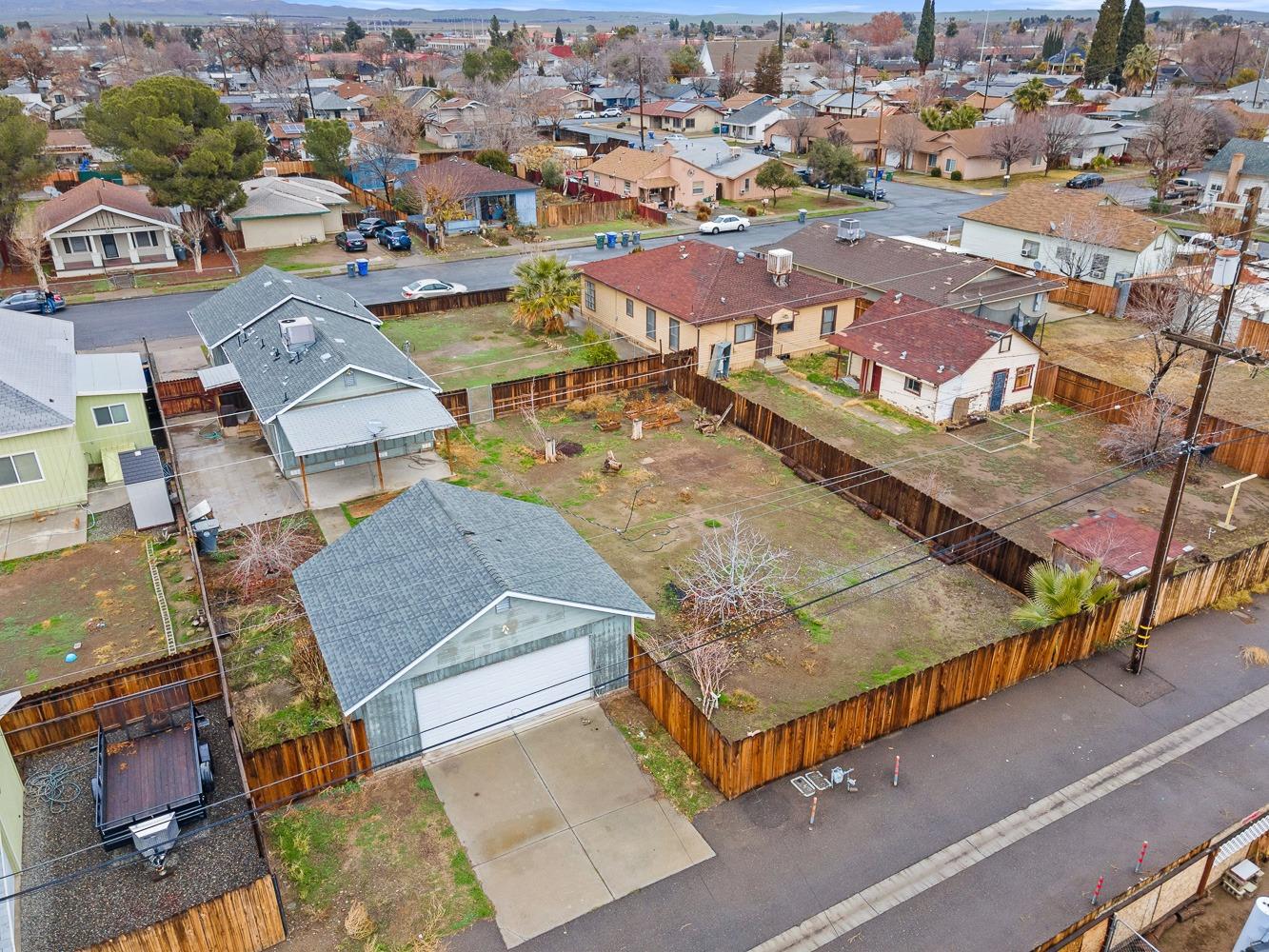 249 Jackson Street Coalinga, CA 93210 - Photo 37 of 42 an aerial view of residential houses with outdoor space
