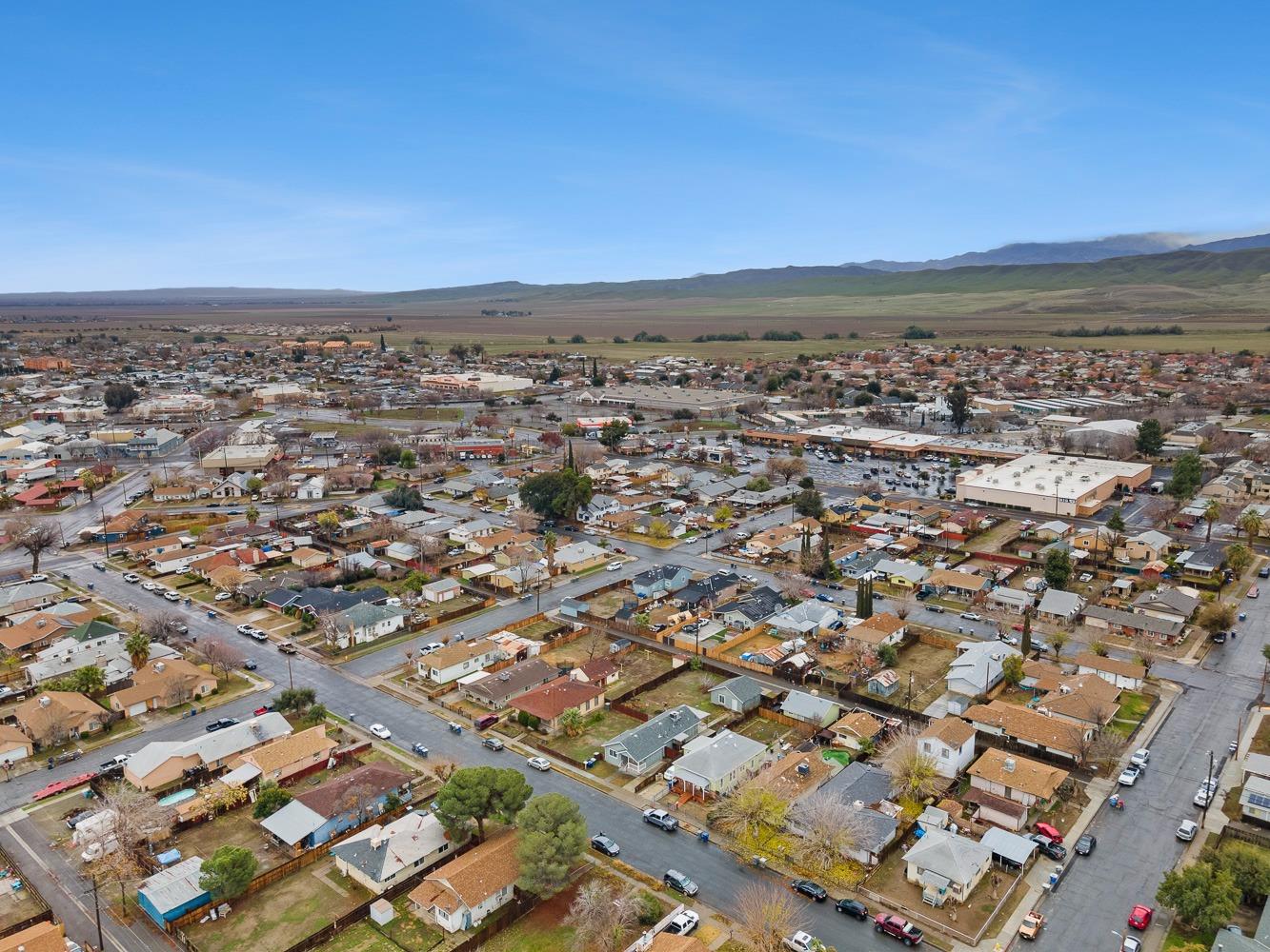249 Jackson Street Coalinga, CA 93210 - Photo 40 of 42 an aerial view of residential building and ocean