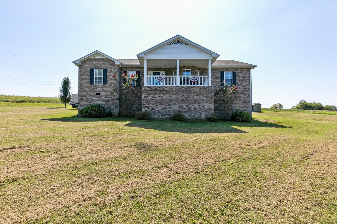 169 Dry Fork Road South Gallatin, TN 37066 - Photo 3 of 23 What a bird's eye view of the pond from the front porch!