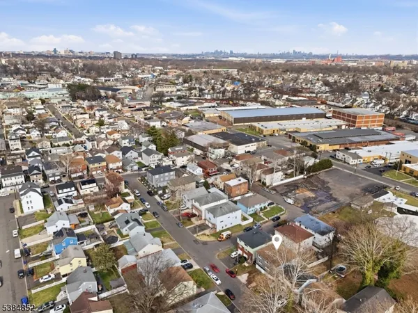 an aerial view of residential building with parking space