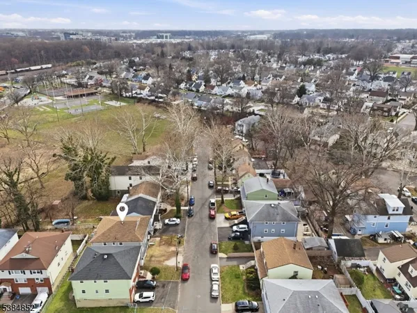 an aerial view of a city with lots of residential buildings