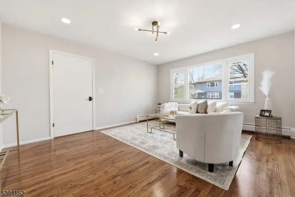 a living room with couches and a coffee table