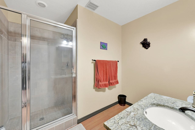 655 Ogden Canyon Road Ogden, UT 84401 - Photo 21 of 50 Shower with chrome-framed glass enclosure and tiled walls