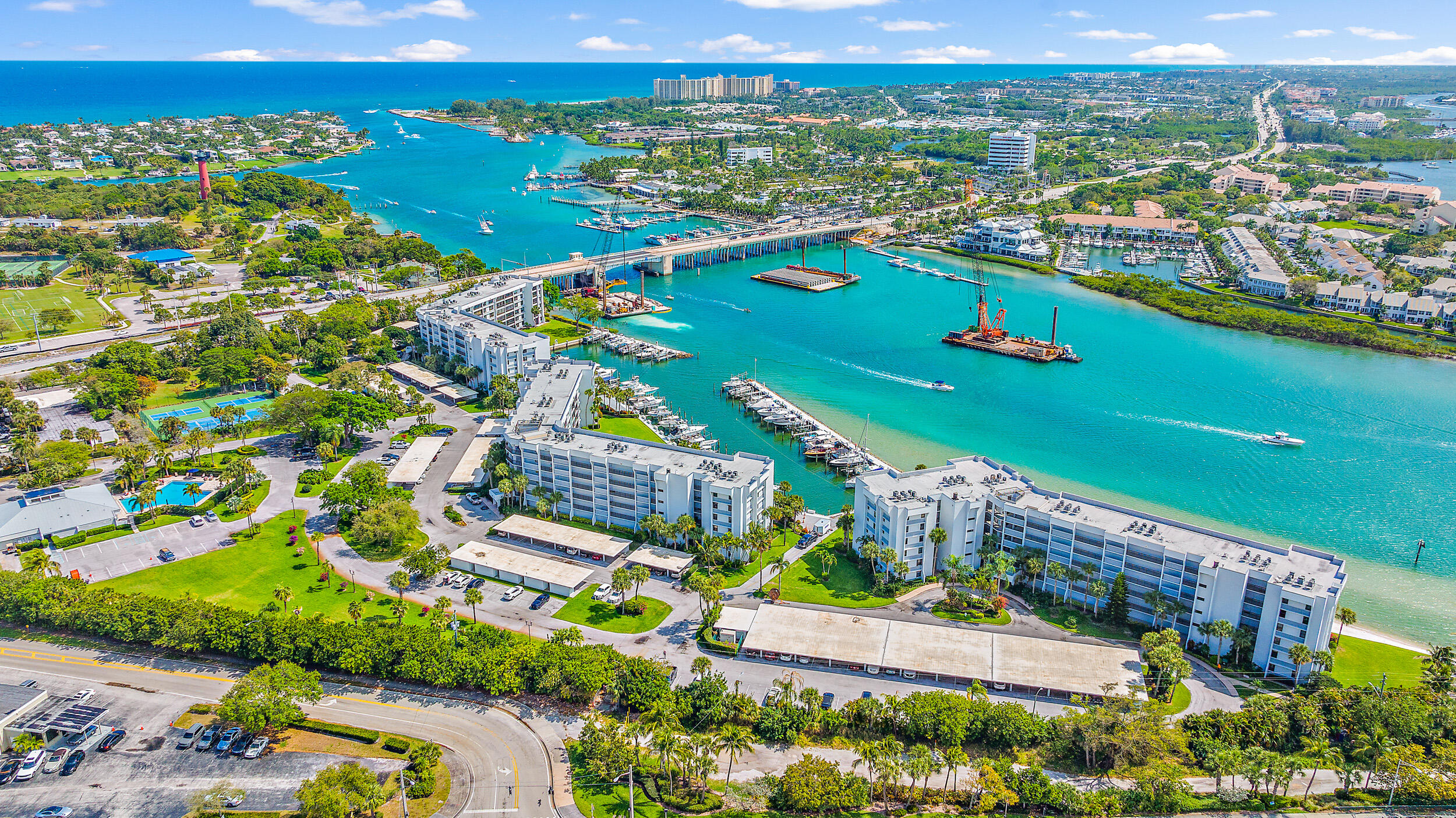1648 Jupiter Cove Drive, Unit 514B Jupiter, FL 33469 - Photo 18 of 21 a view of a city with lots of buildings