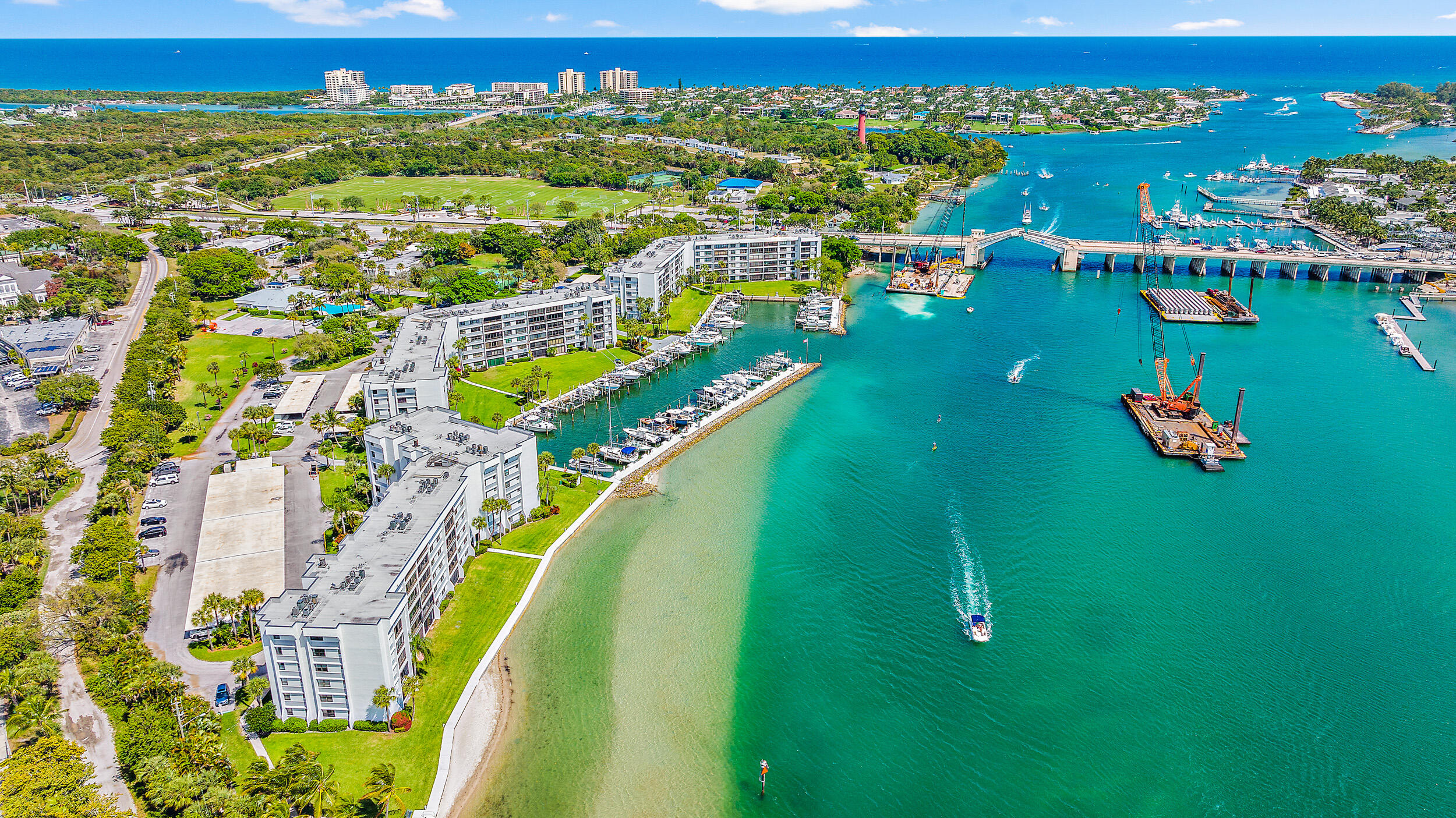 1648 Jupiter Cove Drive, Unit 514B Jupiter, FL 33469 - Photo 19 of 21 an aerial view of tennis court