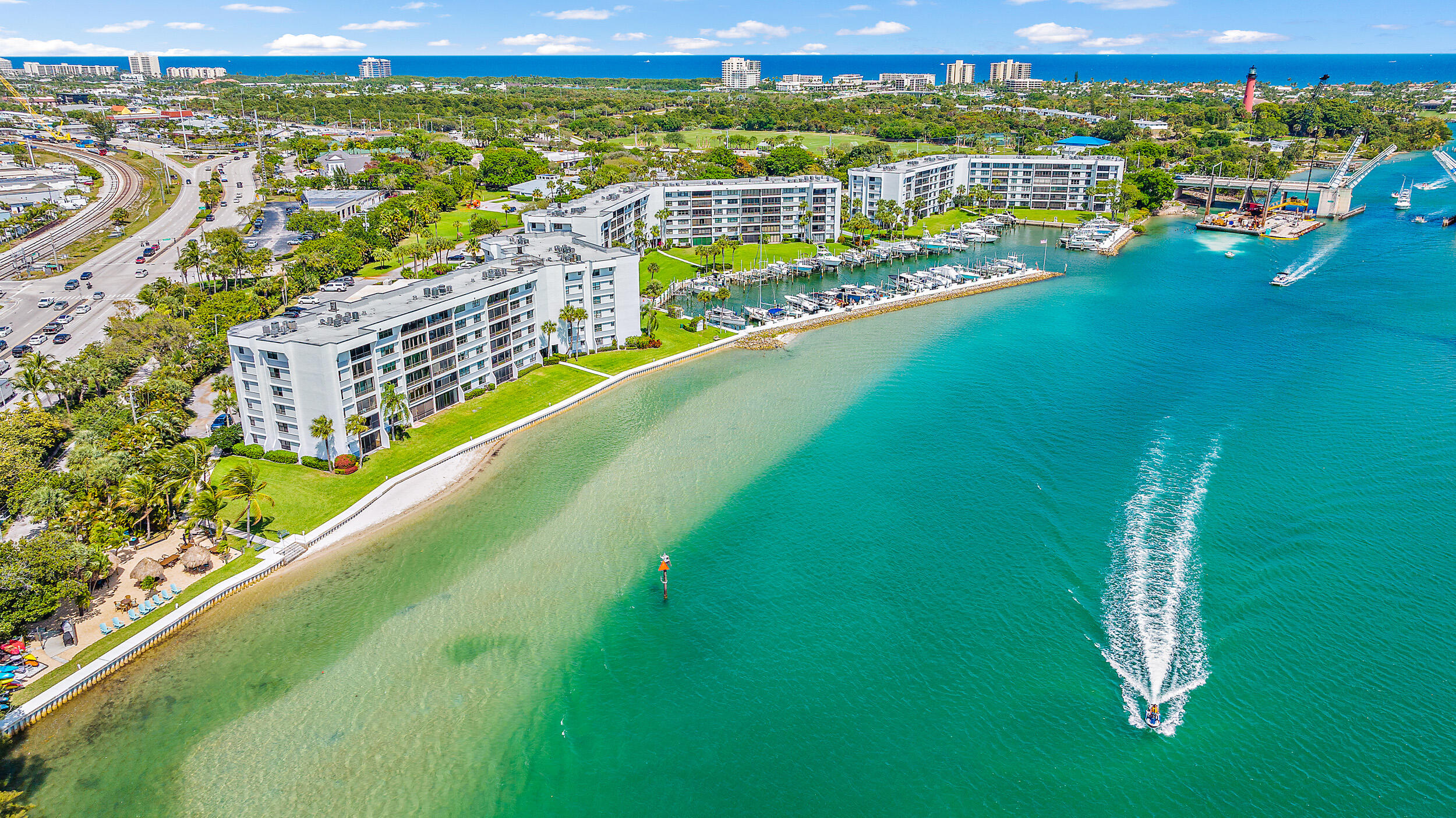 1648 Jupiter Cove Drive, Unit 514B Jupiter, FL 33469 - Photo 20 of 21 a view of a city from a balcony
