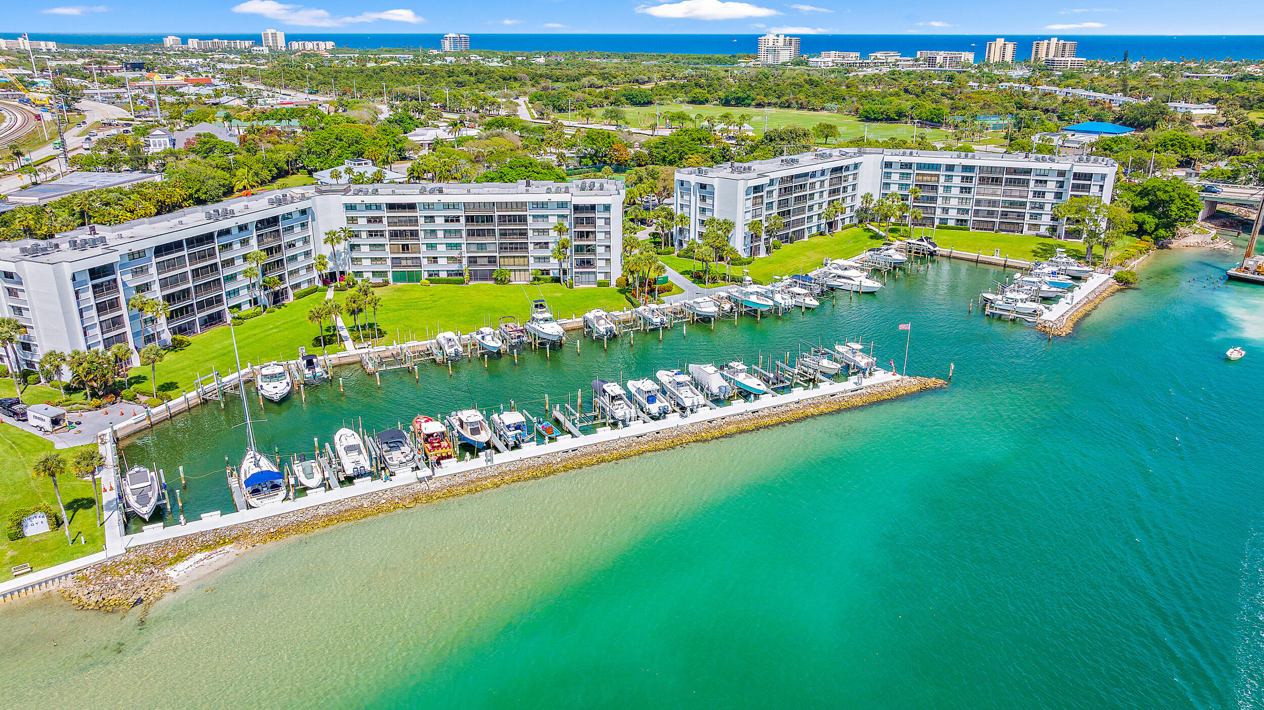 1648 Jupiter Cove Drive, Unit 514B Jupiter, FL 33469 - Photo 21 of 21 a view of a city with an ocean view