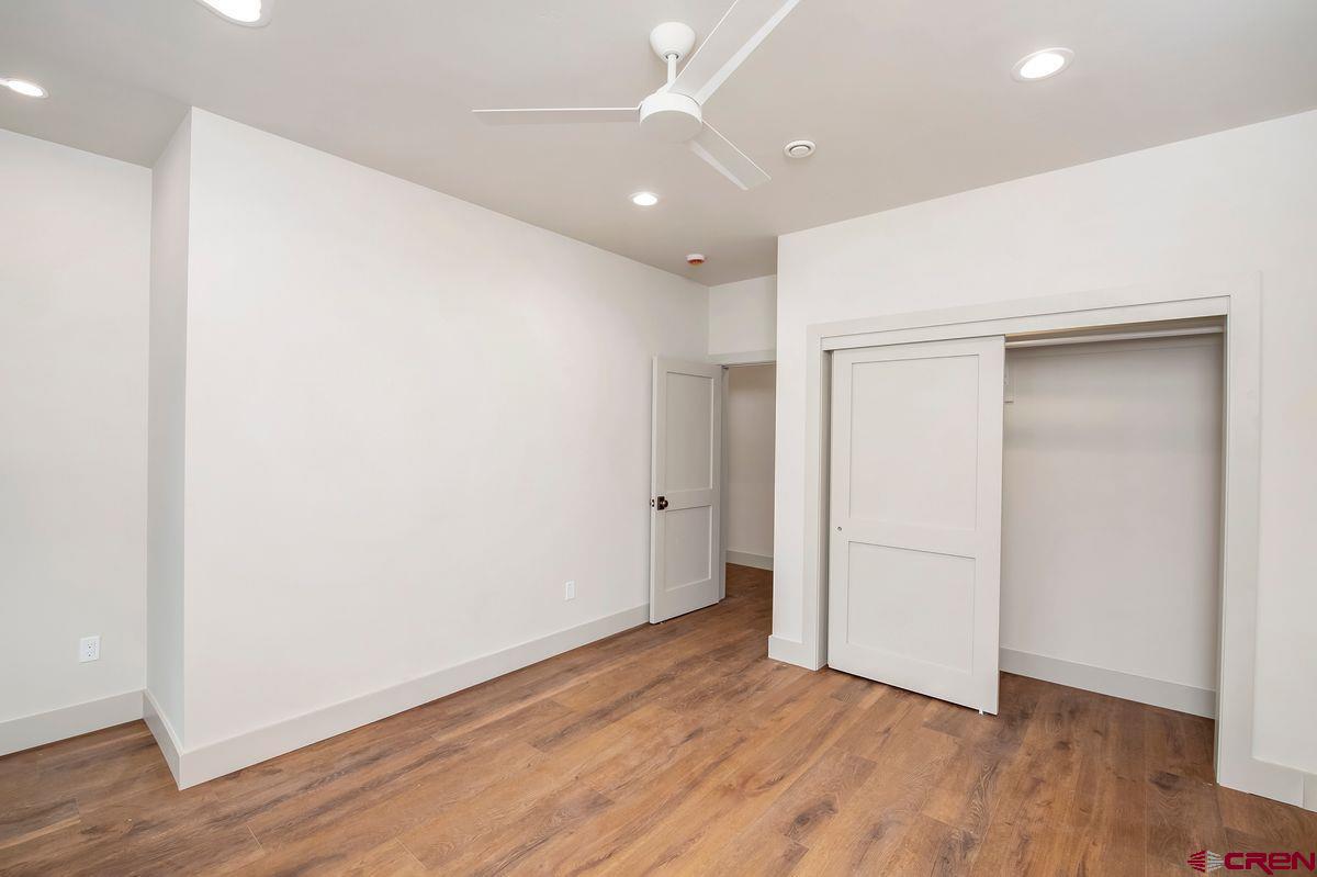 180 Elk Valley Road, Unit 102 Crested Butte, CO 81224 - Photo 11 of 25 wooden floor in an empty room with wooden floor