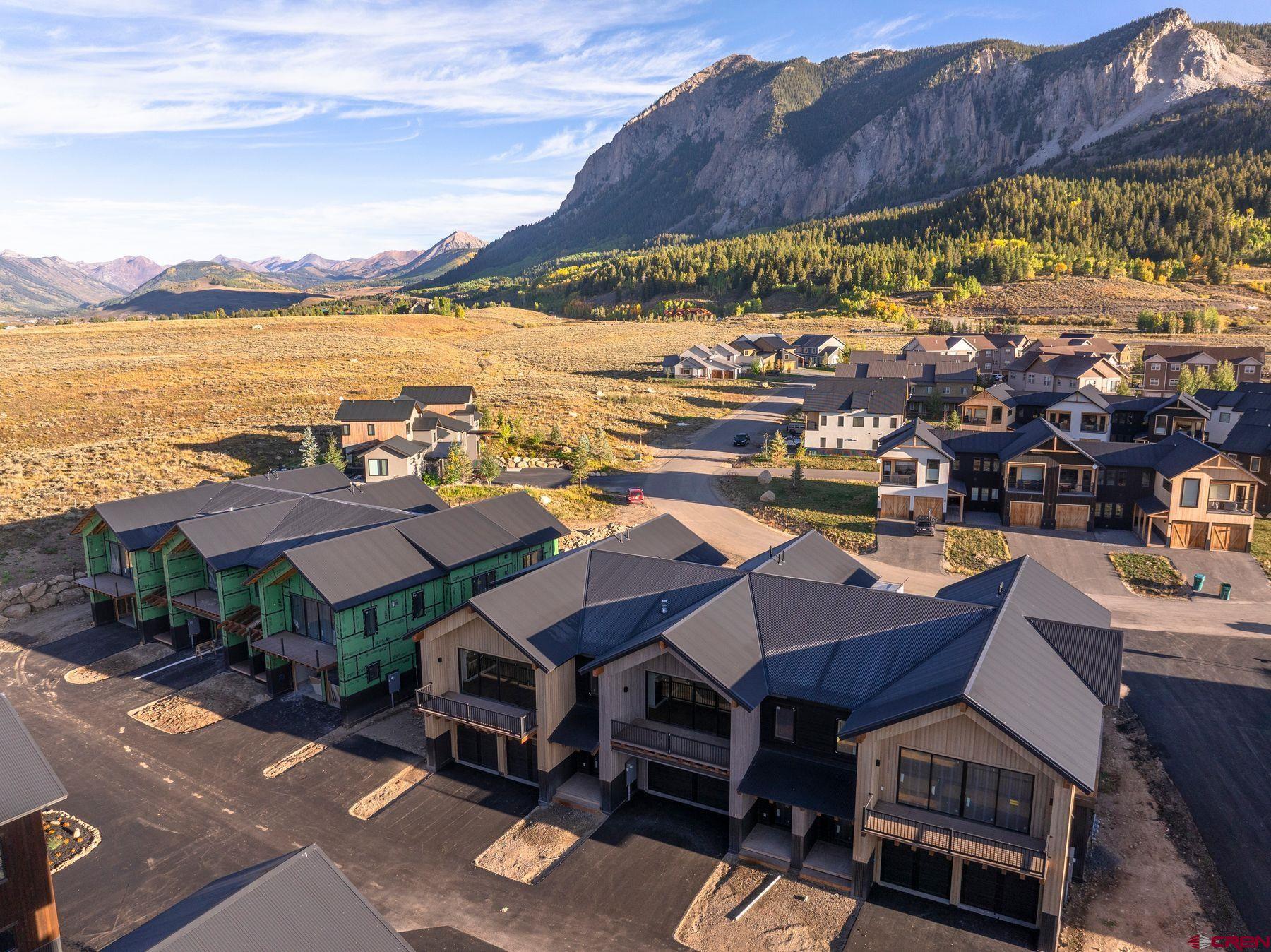 180 Elk Valley Road, Unit 102 Crested Butte, CO 81224 - Photo 2 of 25 a view of a terrace with sitting area