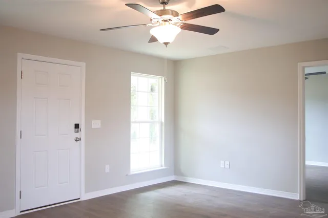 a bathroom with a shower and a shower head