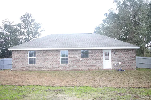 a kitchen with stainless steel appliances granite countertop a stove microwave and oven