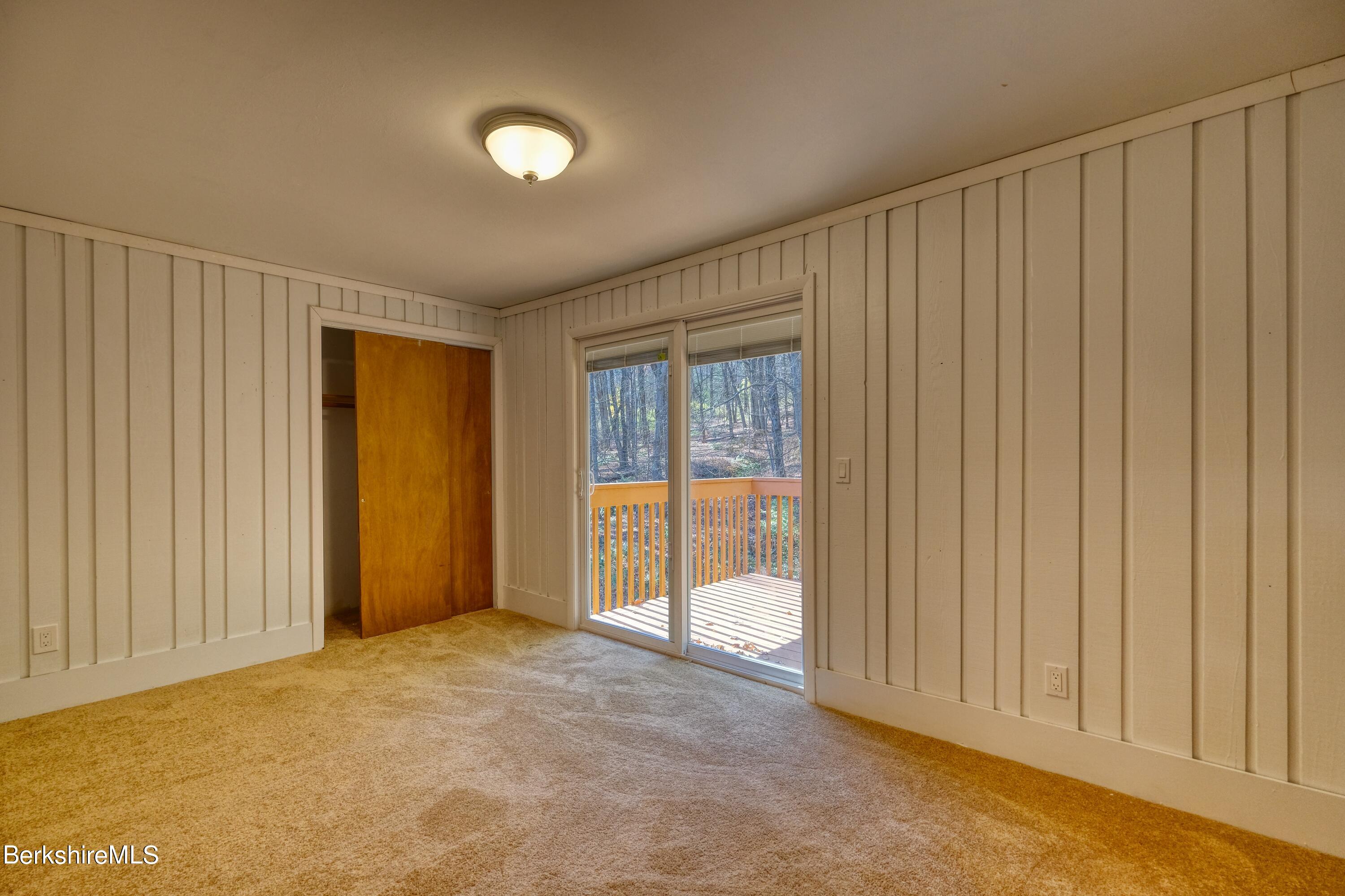 274 East Slope Road Richmond, MA 01201 - Photo 22 of 44 a view of an empty room with a window