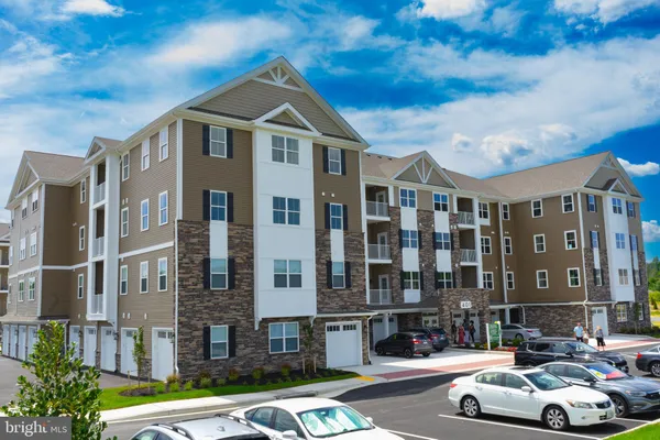 a front view of a building with street view