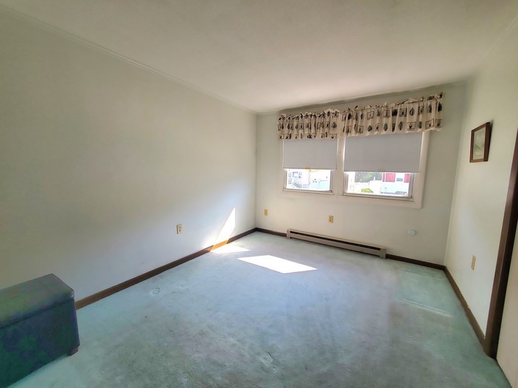 33 Marique Drive Lawrence, MA 01843 - Photo 12 of 20 a view of an empty room and window