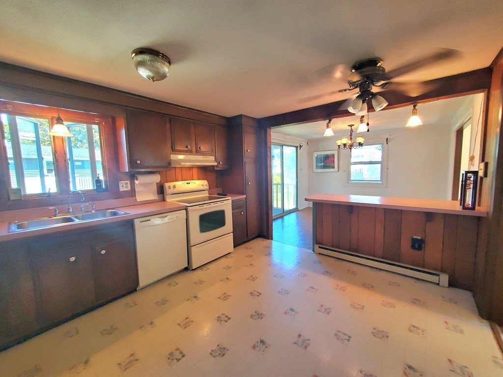 33 Marique Drive Lawrence, MA 01843 - Photo 8 of 20 a kitchen with granite countertop a stove and cabinets