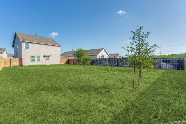 a house view with a garden space