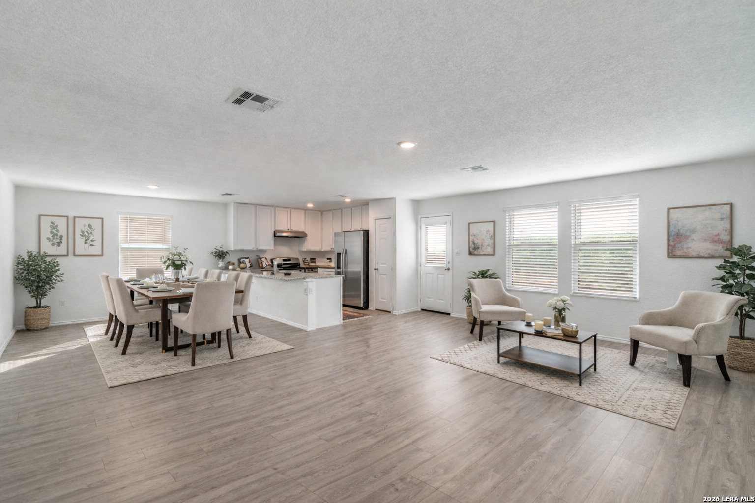 362 Ambush Ridge San Antonio, TX 78220 - Photo 7 of 26 a living room with furniture and a wooden floor