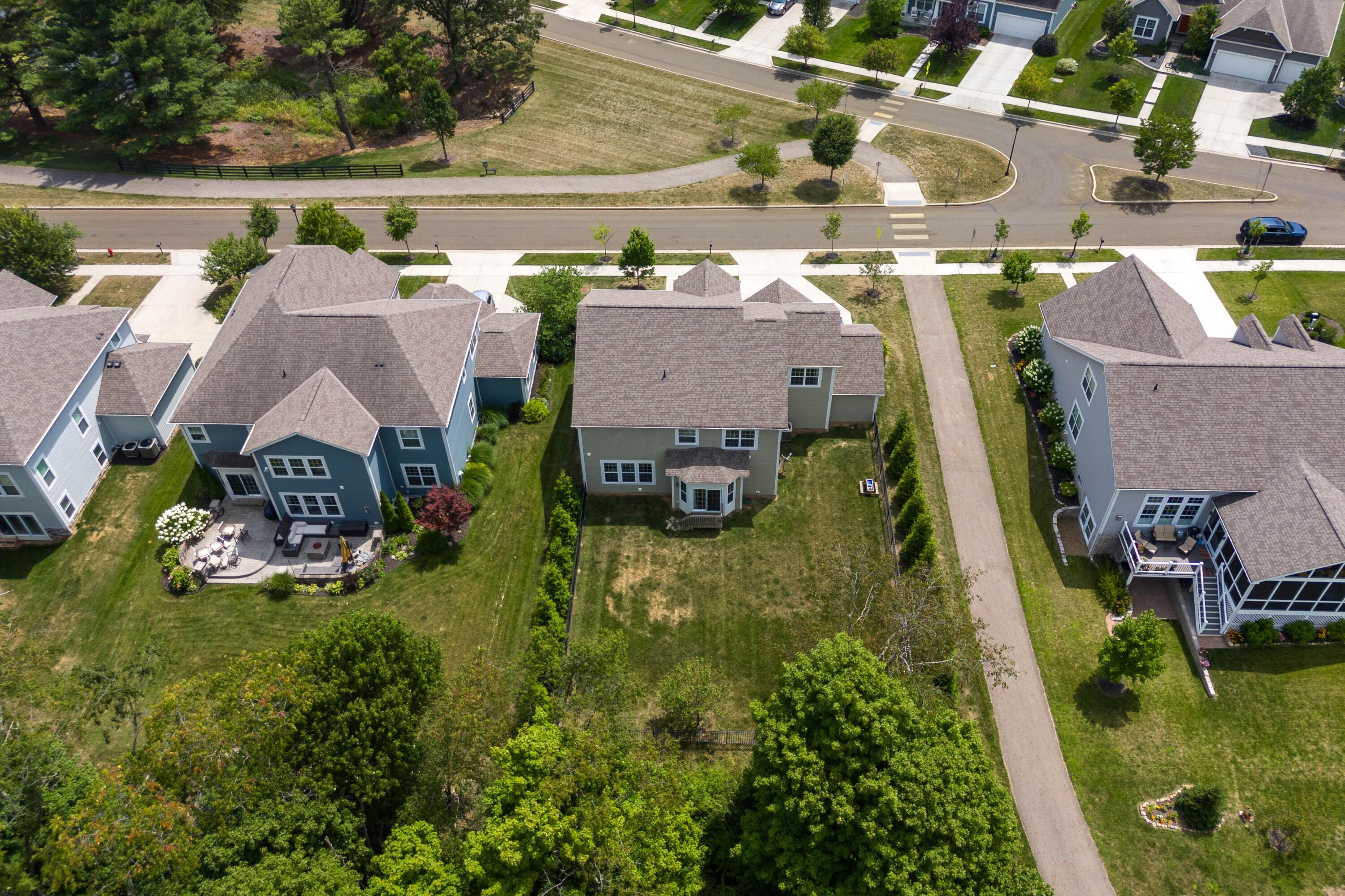 706 Bigham Ridge Boulevard Westerville, OH 43081 - Photo 58 of 62 Drone view of the back yard. no one directly behind or across