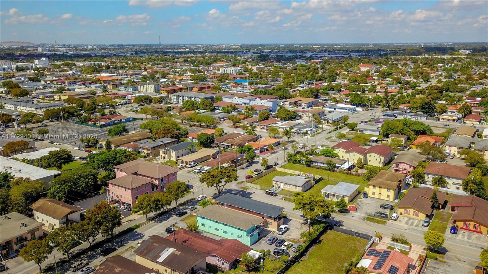 642 East 2nd Avenue, Unit A Hialeah, FL 33010 - Photo 22 of 27 an aerial view of residential building with parking space