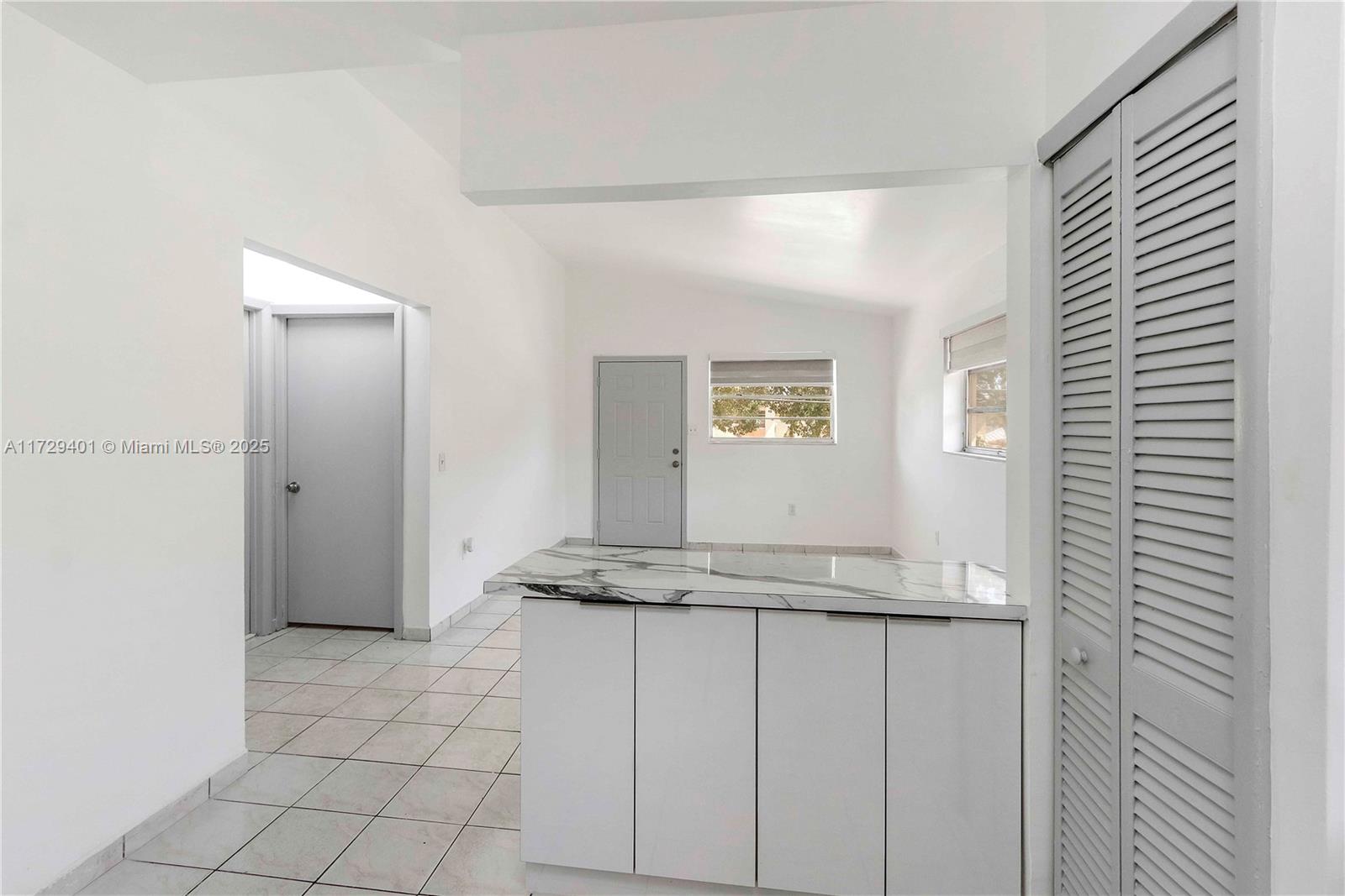642 East 2nd Avenue, Unit A Hialeah, FL 33010 - Photo 5 of 27 a view of a sink and a mirror